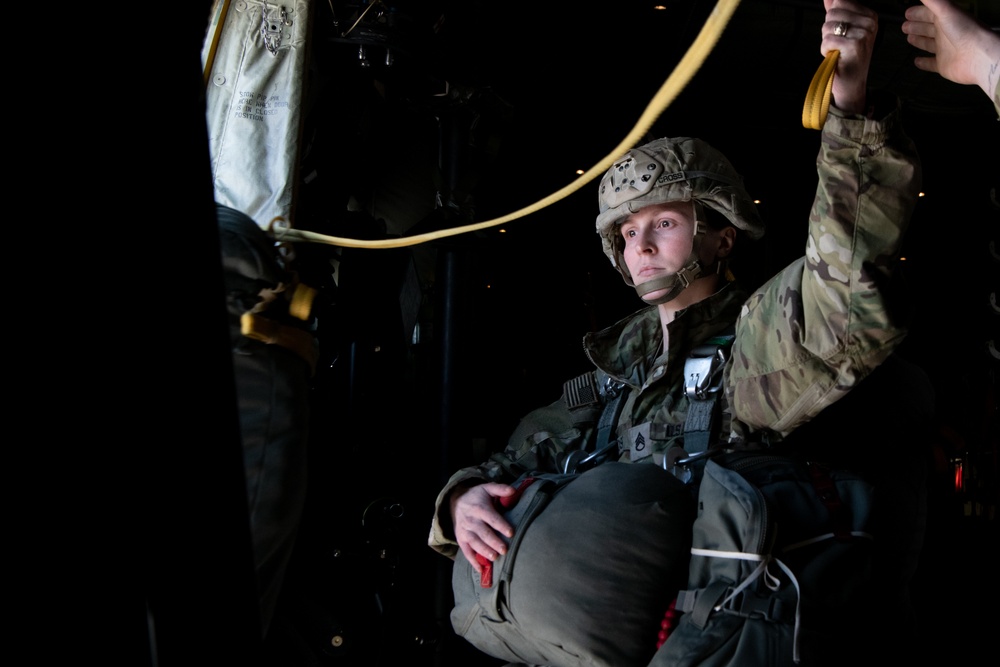 Ladies of 11th Airborne leap during all-women jump