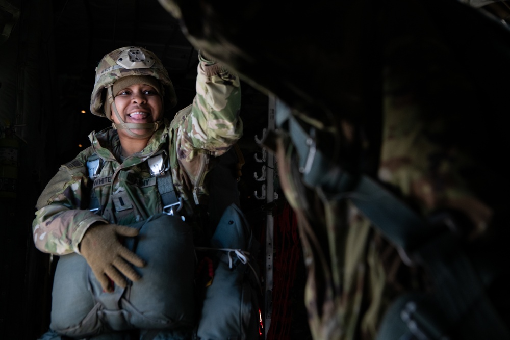 Ladies of 11th Airborne leap during all-women jump