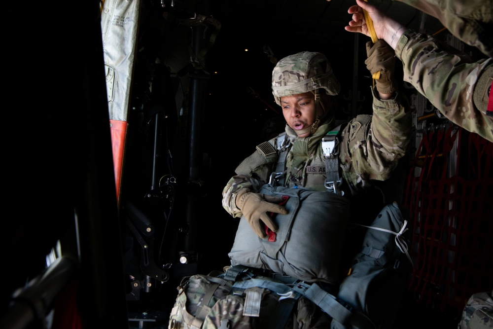 Ladies of 11th Airborne leap during all-women jump