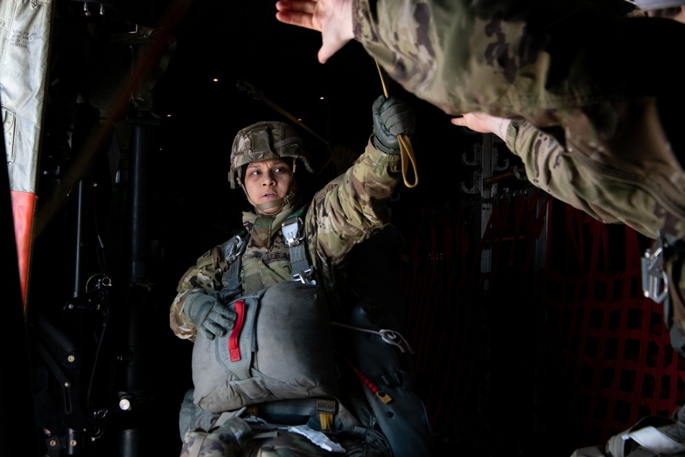 Ladies of 11th Airborne leap during all-women jump