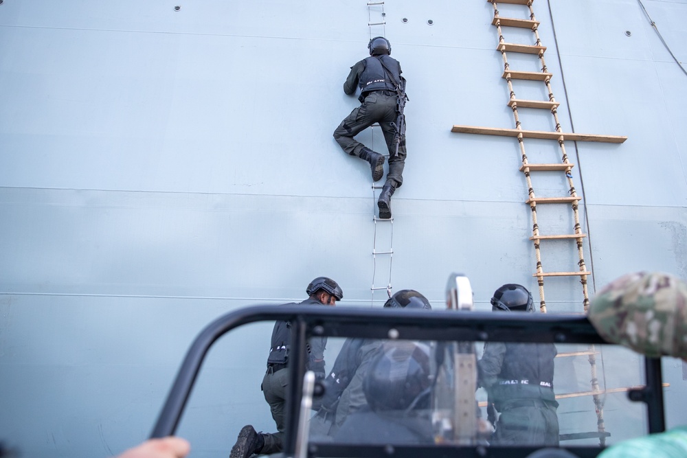 member of Nigeria’s Armed Forces Climbs a Ladder During Hook-And-Climb Drills Flintlock 2023