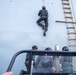 member of Nigeria’s Armed Forces Climbs a Ladder During Hook-And-Climb Drills Flintlock 2023