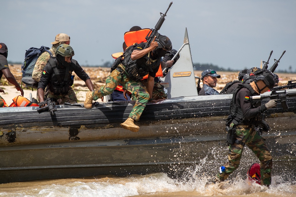 Members of The Ghana Armed Forces Jump Off a Boat to Take up Fighting Positions Flintlock 2023