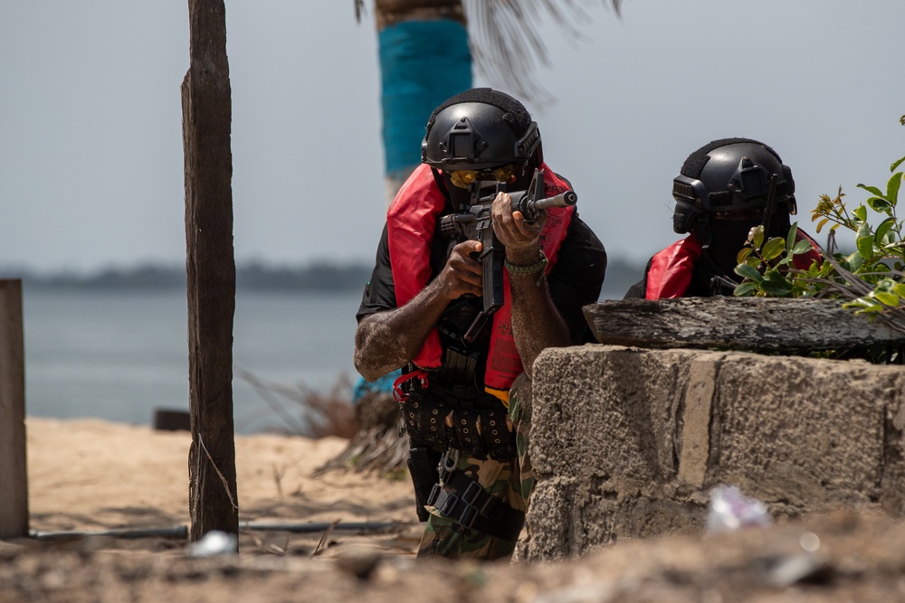 Members of the Ghana Armed Forces pull security Flintlock 2023