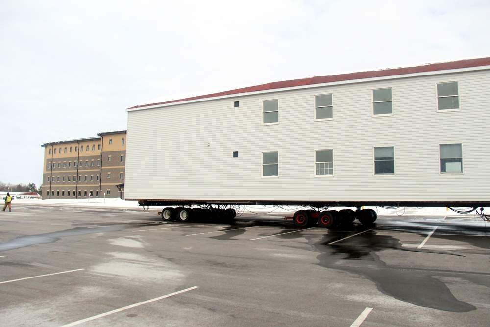 History made: Contractor moves first two World War II-era barracks at Fort McCoy