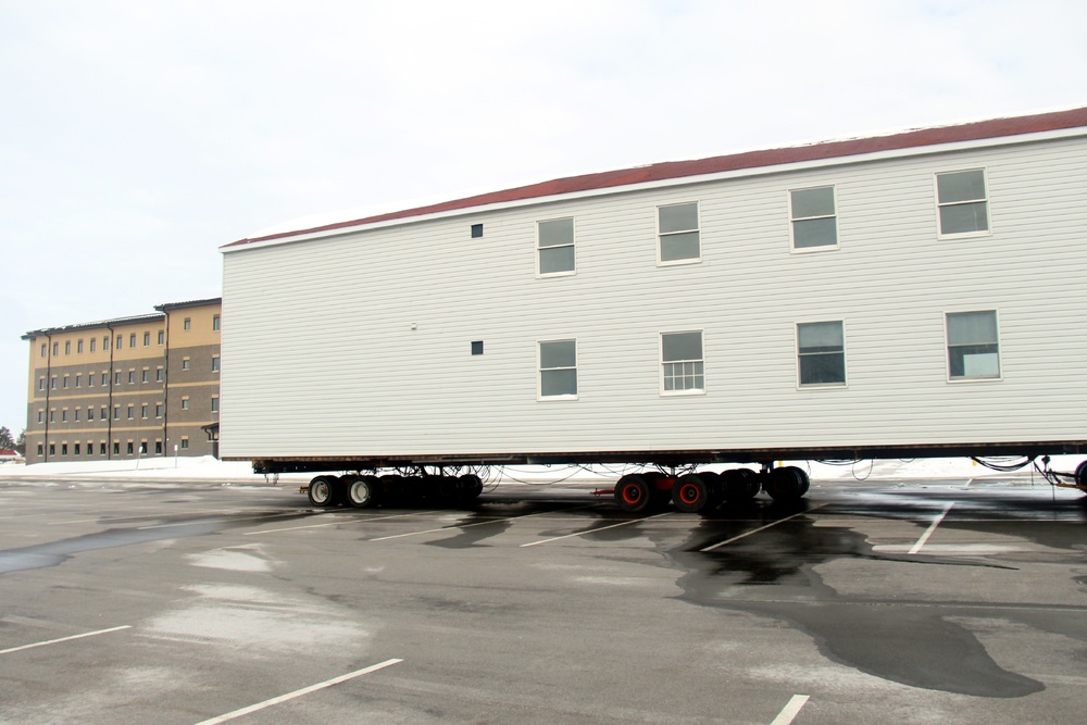 History made: Contractor moves first two World War II-era barracks at Fort McCoy