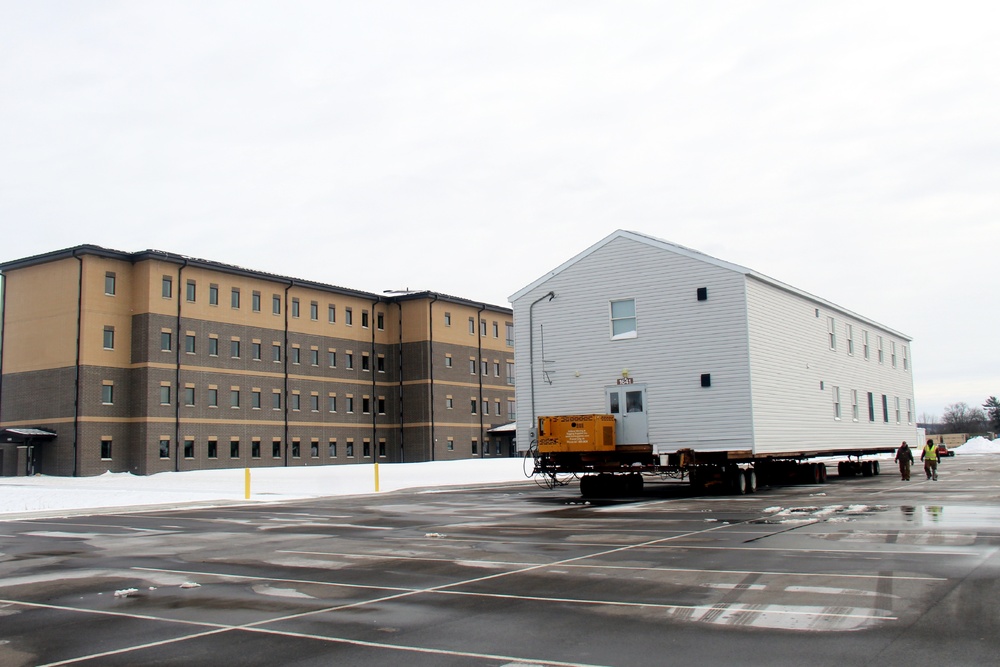 History made: Contractor moves first two World War II-era barracks at Fort McCoy