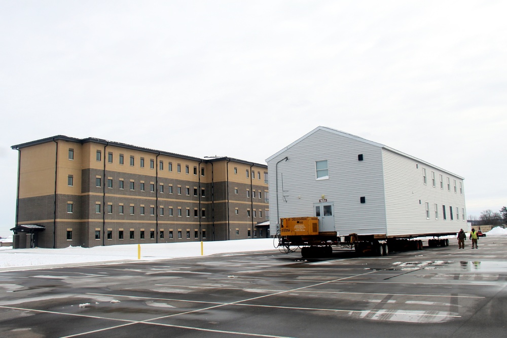 History made: Contractor moves first two World War II-era barracks at Fort McCoy