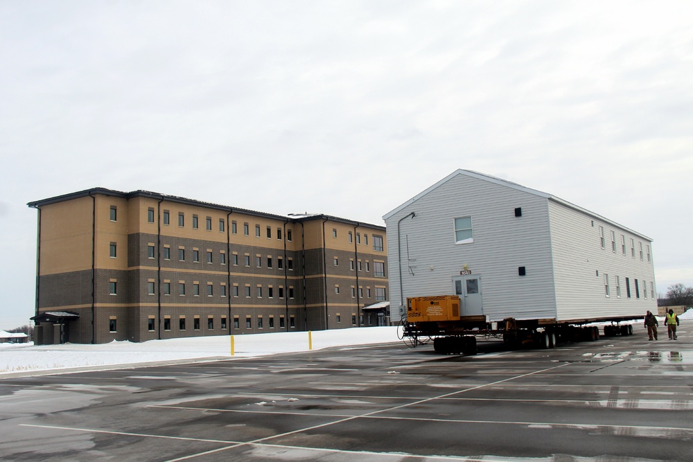 History made: Contractor moves first two World War II-era barracks at Fort McCoy