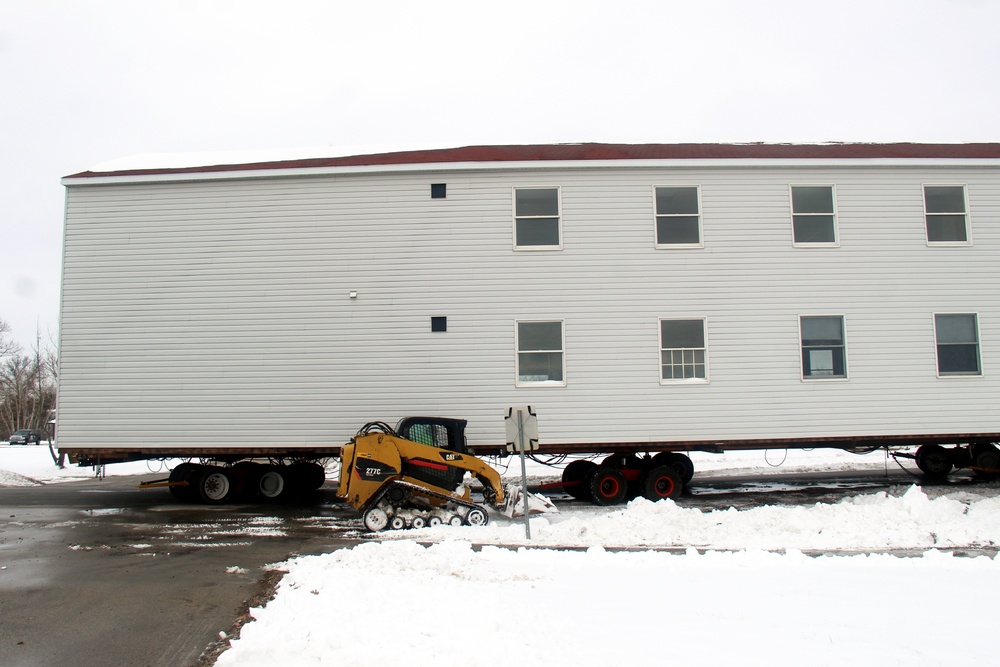 History made: Contractor moves first two World War II-era barracks at Fort McCoy