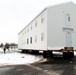 History made: Contractor moves first two World War II-era barracks at Fort McCoy