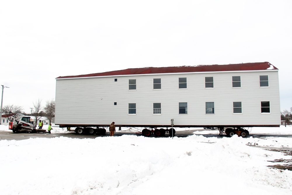 History made: Contractor moves first two World War II-era barracks at Fort McCoy