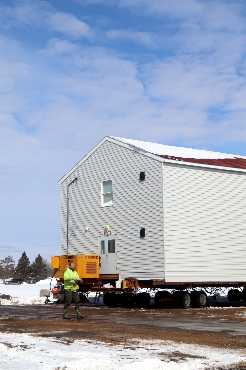 History made: Contractor moves first two World War II-era barracks at Fort McCoy