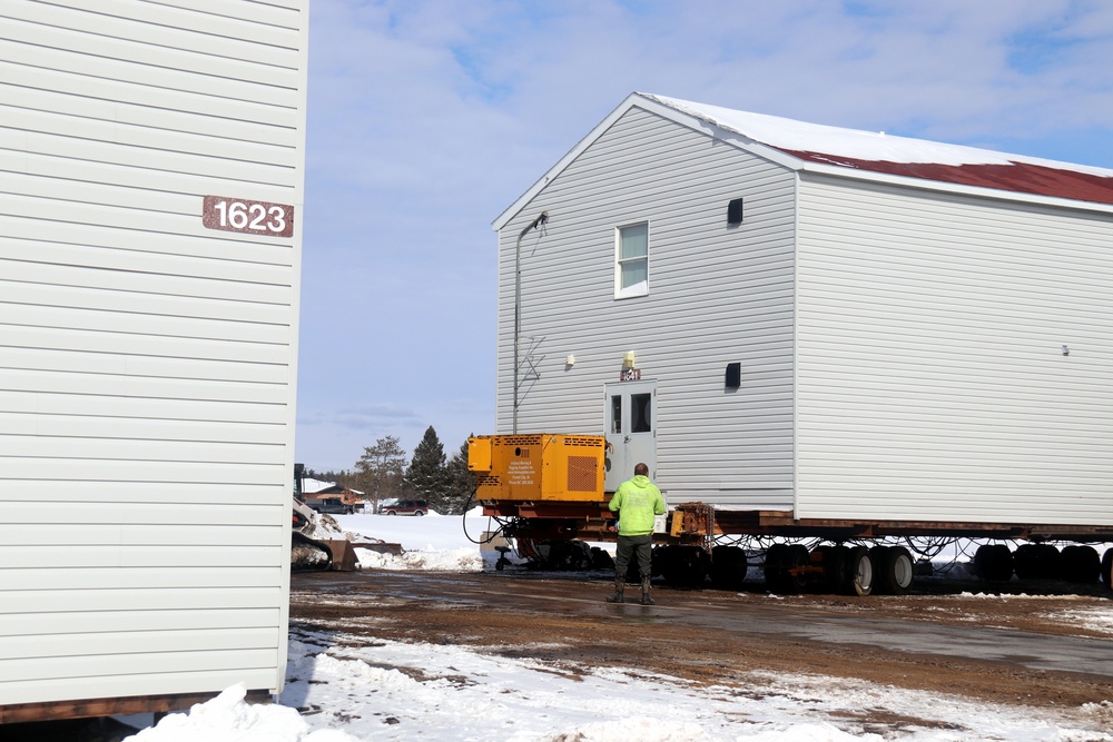 History made: Contractor moves first two World War II-era barracks at Fort McCoy