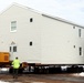 History made: Contractor moves first two World War II-era barracks at Fort McCoy