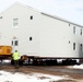 History made: Contractor moves first two World War II-era barracks at Fort McCoy