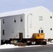 History made: Contractor moves first two World War II-era barracks at Fort McCoy