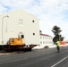 History made: Contractor moves first two World War II-era barracks at Fort McCoy