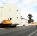 History made: Contractor moves first two World War II-era barracks at Fort McCoy