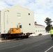 History made: Contractor moves first two World War II-era barracks at Fort McCoy