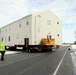 History made: Contractor moves first two World War II-era barracks at Fort McCoy