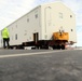 History made: Contractor moves first two World War II-era barracks at Fort McCoy