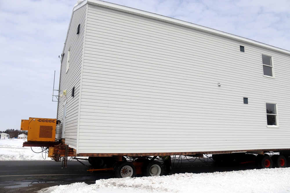 History made: Contractor moves first two World War II-era barracks at Fort McCoy