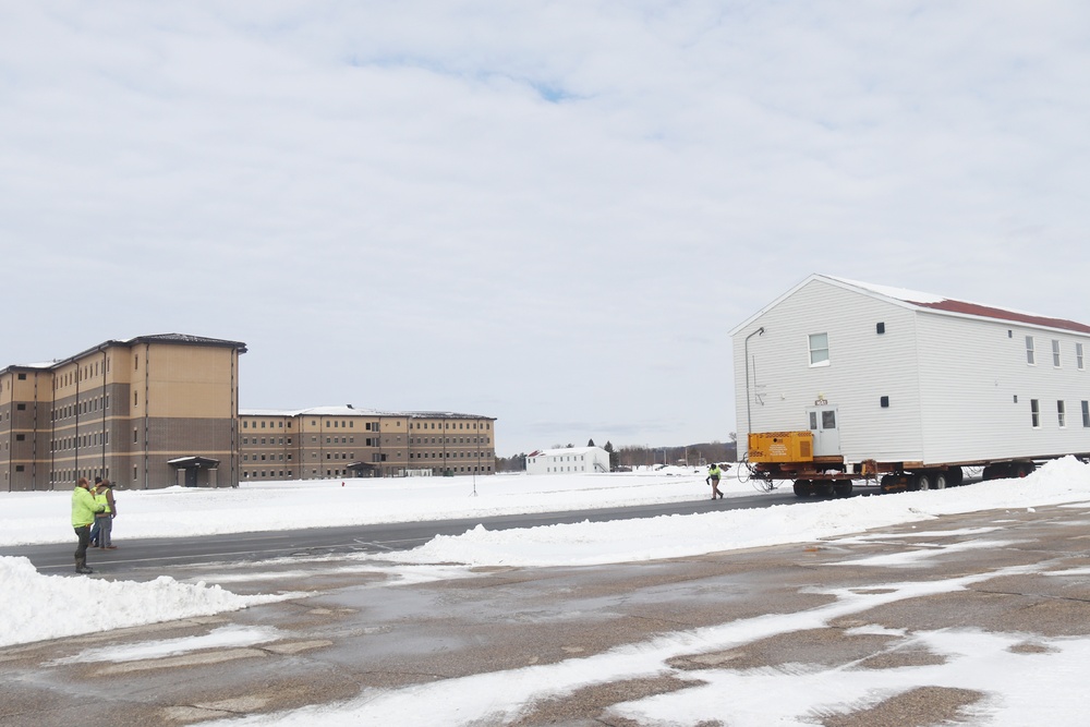 History made: Contractor moves first two World War II-era barracks at Fort McCoy