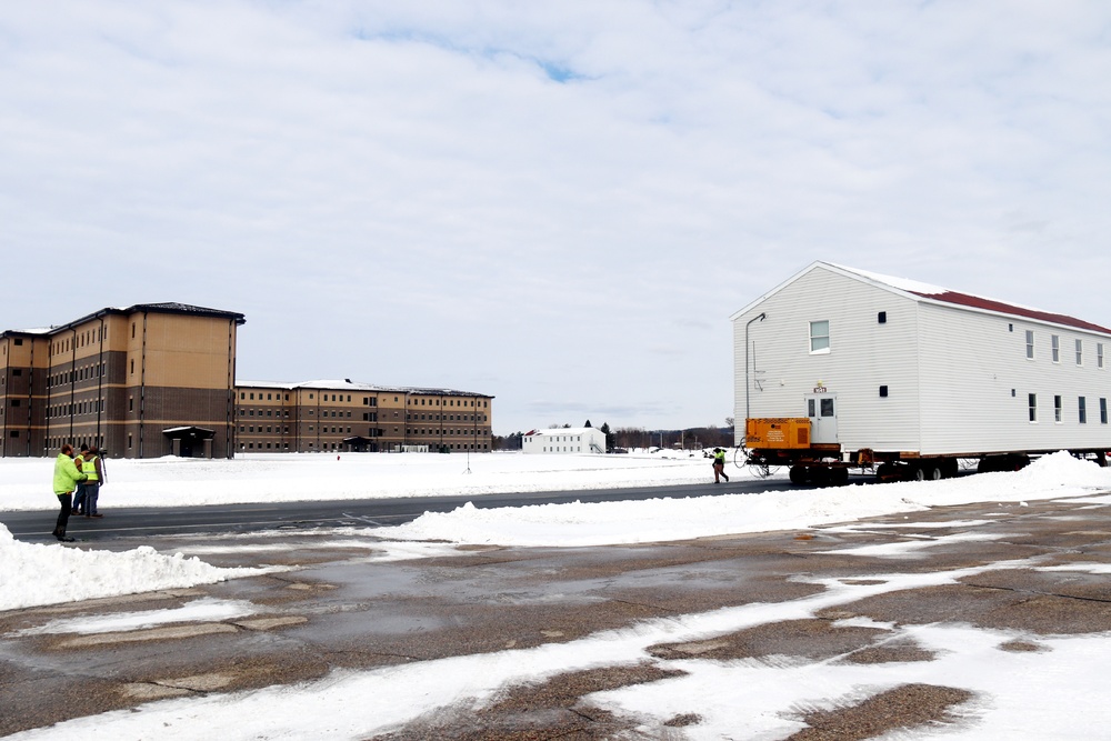 History made: Contractor moves first two World War II-era barracks at Fort McCoy