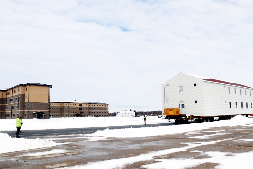 History made: Contractor moves first two World War II-era barracks at Fort McCoy