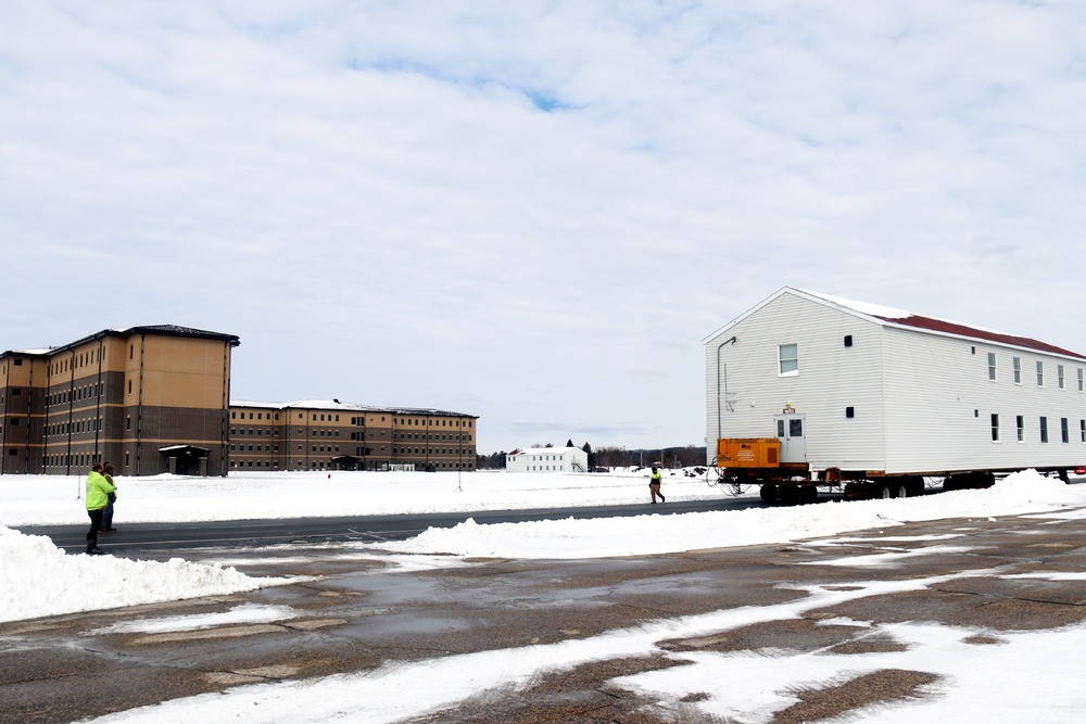 History made: Contractor moves first two World War II-era barracks at Fort McCoy