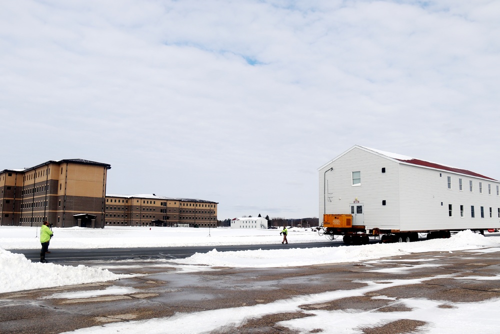 History made: Contractor moves first two World War II-era barracks at Fort McCoy