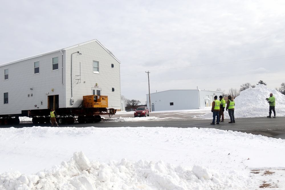 History made: Contractor moves first two World War II-era barracks at Fort McCoy