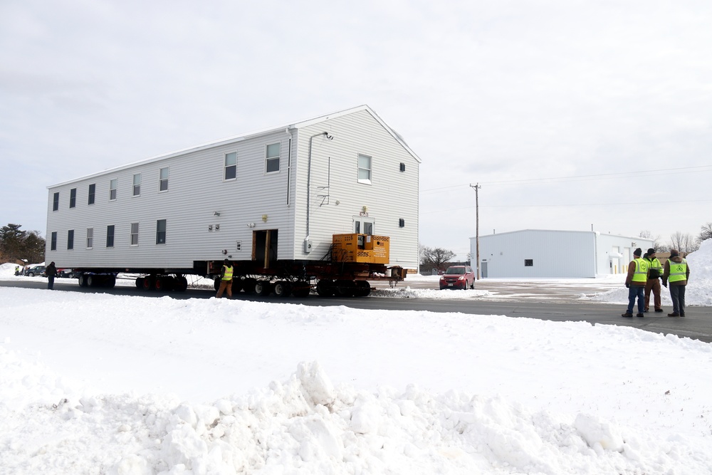 History made: Contractor moves first two World War II-era barracks at Fort McCoy