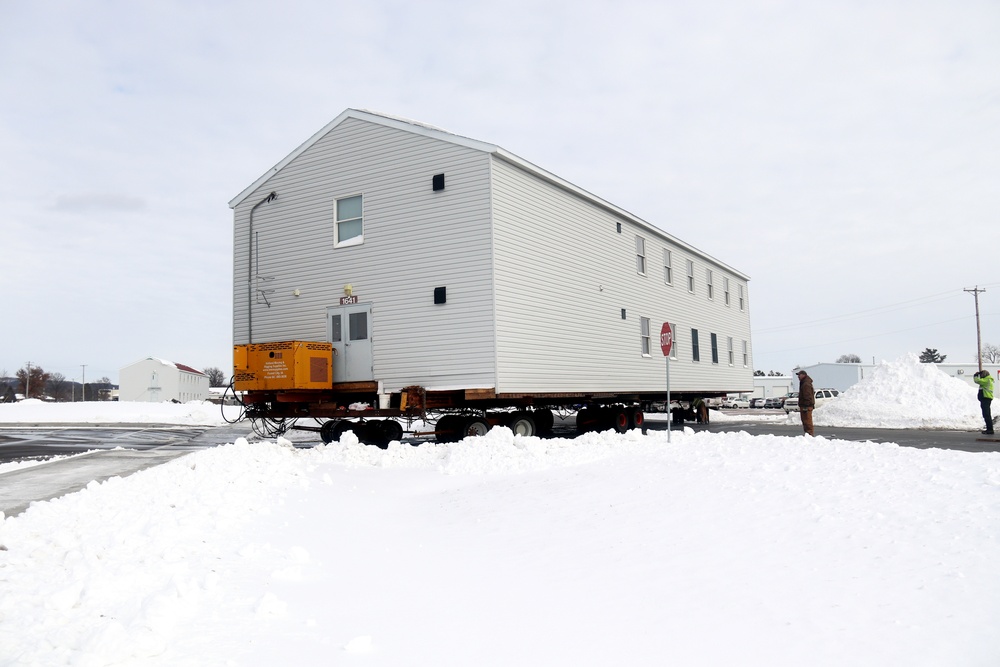 History made: Contractor moves first two World War II-era barracks at Fort McCoy