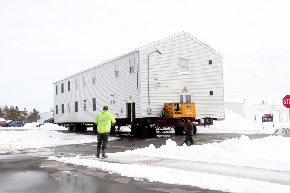 History made: Contractor moves first two World War II-era barracks at Fort McCoy