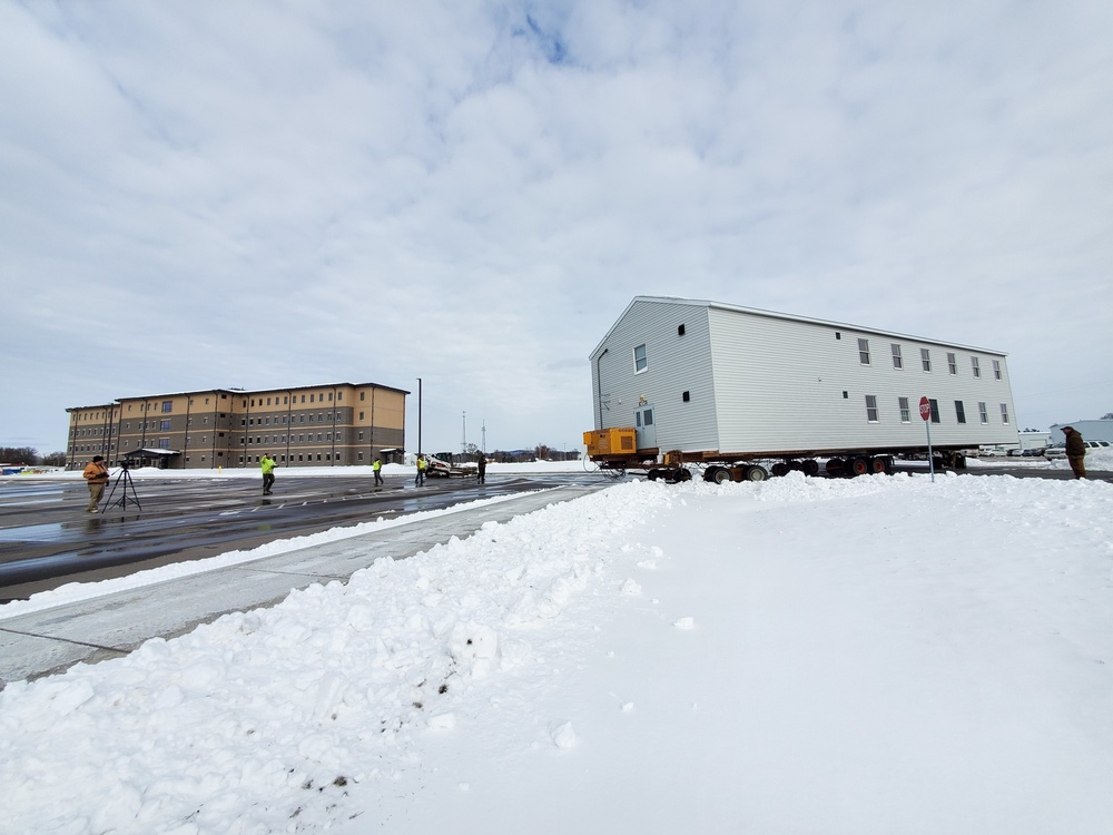 History made: Contractor moves first two World War II-era barracks at Fort McCoy