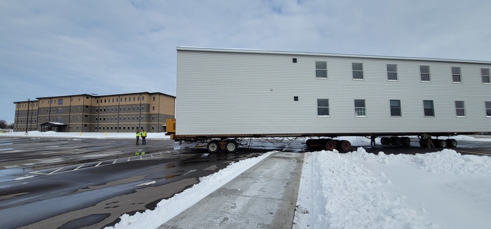 History made: Contractor moves first two World War II-era barracks at Fort McCoy