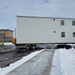 History made: Contractor moves first two World War II-era barracks at Fort McCoy