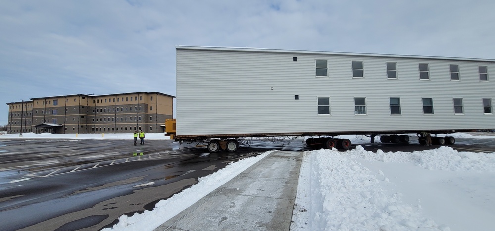 History made: Contractor moves first two World War II-era barracks at Fort McCoy