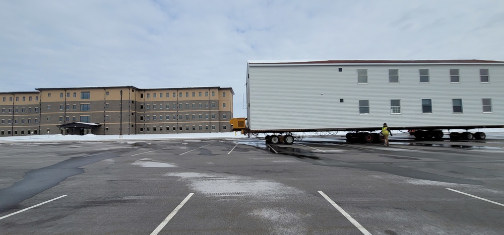 History made: Contractor moves first two World War II-era barracks at Fort McCoy