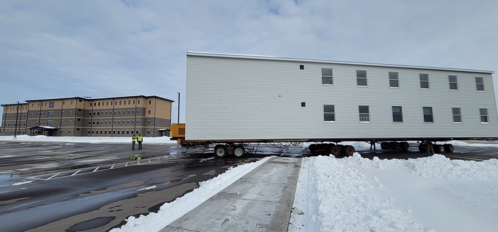 History made: Contractor moves first two World War II-era barracks at Fort McCoy