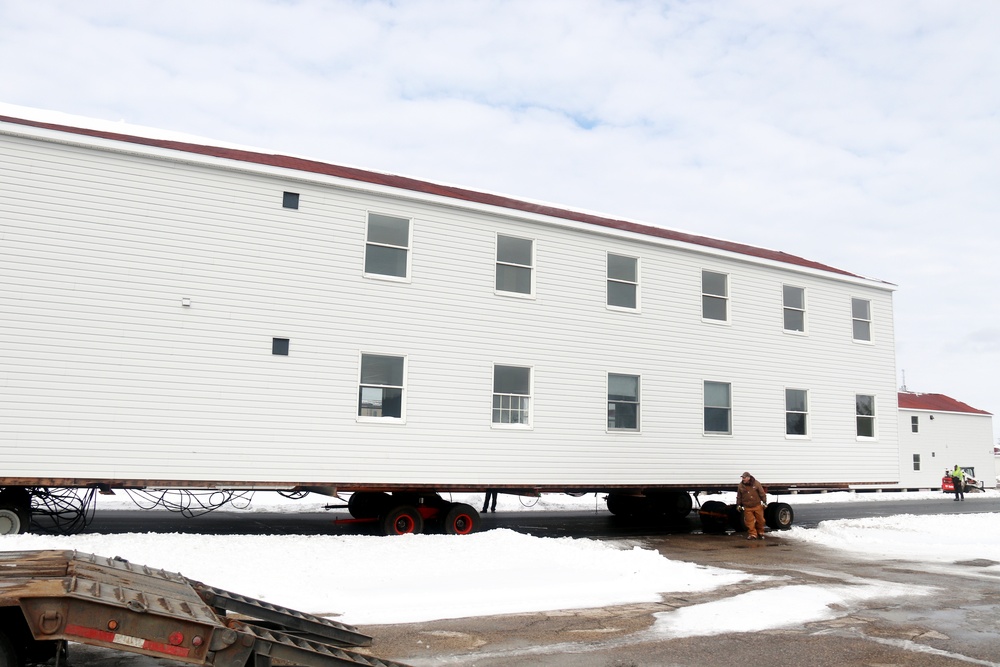 History made: Contractor moves first two World War II-era barracks at Fort McCoy