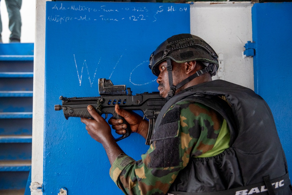 A Member of Nigeria Armed Forces Pulls Security Flintlock 2023