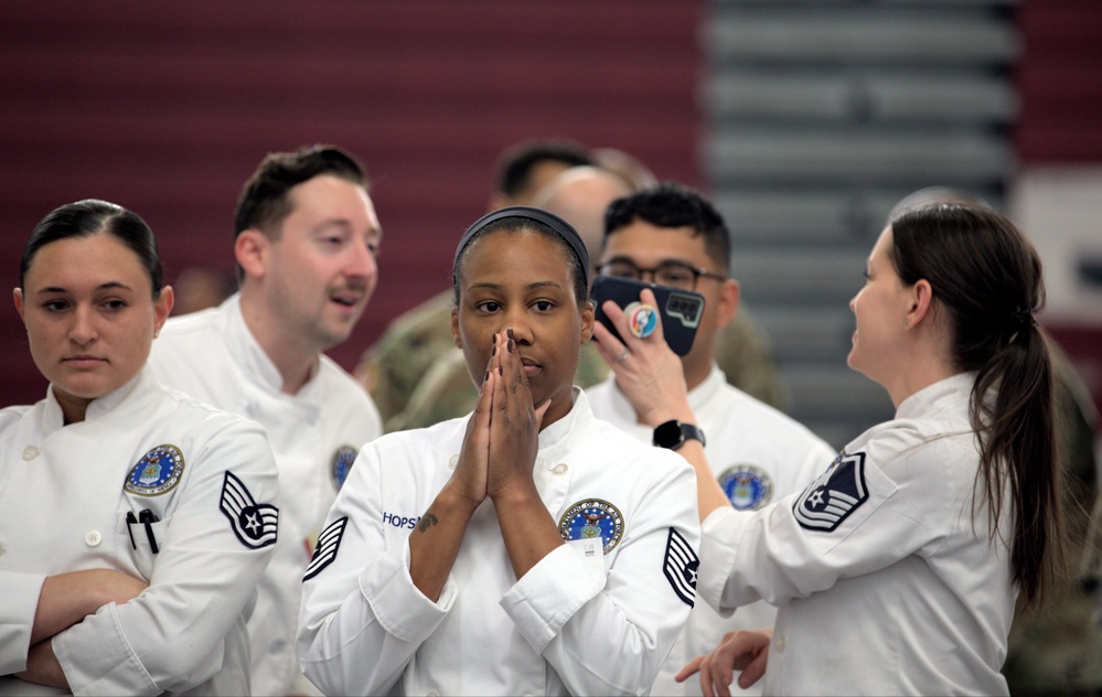 Air Force Tech Sgt. Hopson watches her friends compete