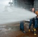 Sailor Discharges Firehose