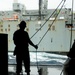 Sailor Prepares Cargo For Transport