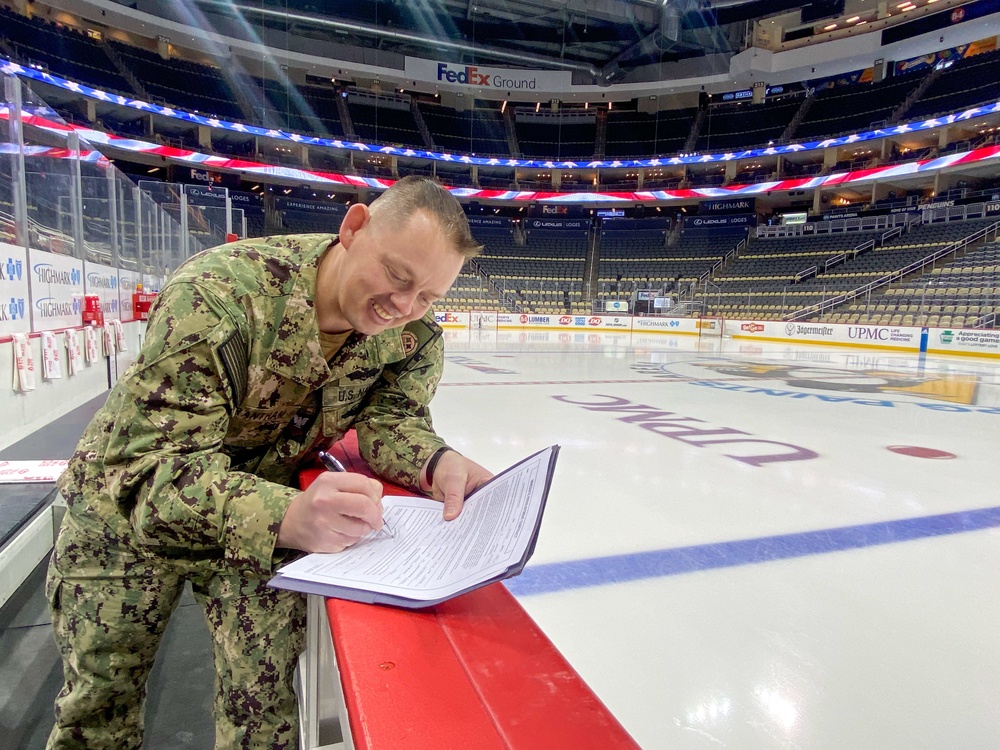 Sailor Reenlists at NHL Arena