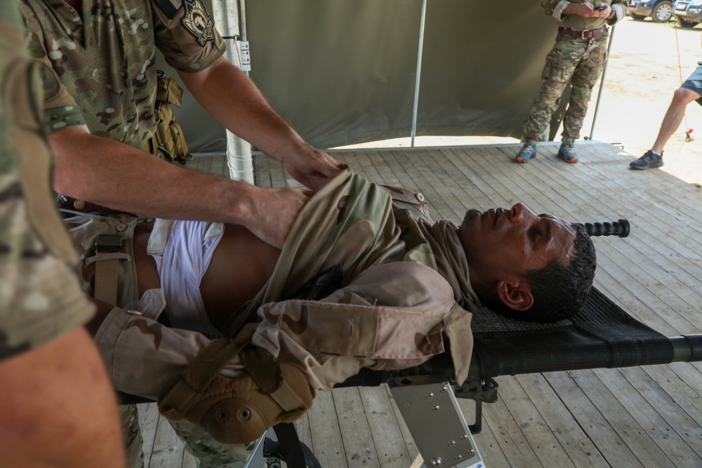 Nigerien Soldiers execute a simulated casualty evacuation during Flintlock
