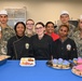 Culinary Specialists showcase the meal they learned to prepare during a themed meal seminar at NAVSUP FLC San Diego.